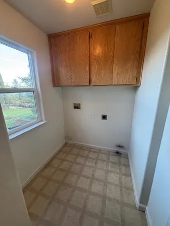 a view of balcony with wooden floor