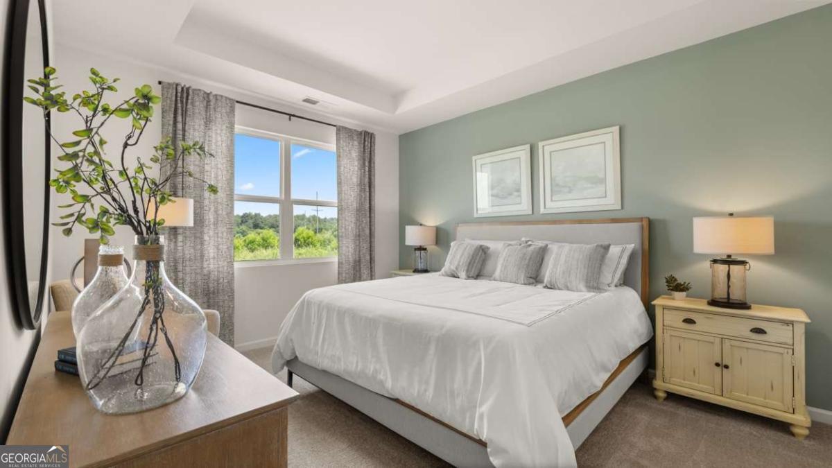 204 Cattle Drive Perry, GA 31069 - Photo 13 of 44 a bedroom with a bed and a window