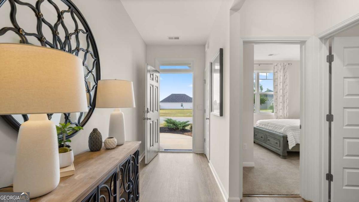 204 Cattle Drive Perry, GA 31069 - Photo 20 of 44 a view of hallway with livingroom and furniture