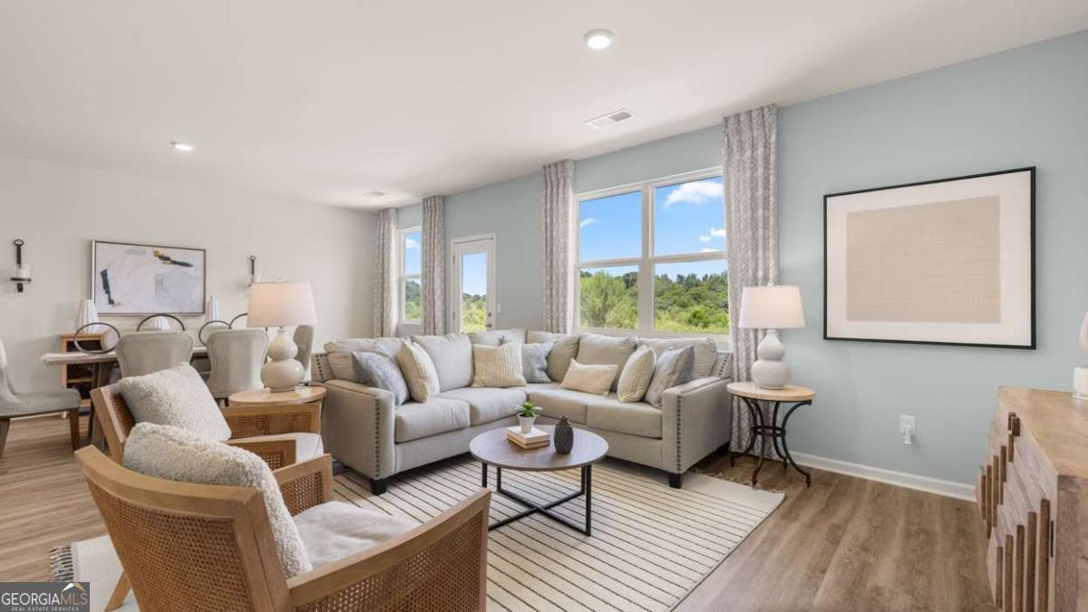 204 Cattle Drive Perry, GA 31069 - Photo 25 of 44 a living room with furniture and a large window