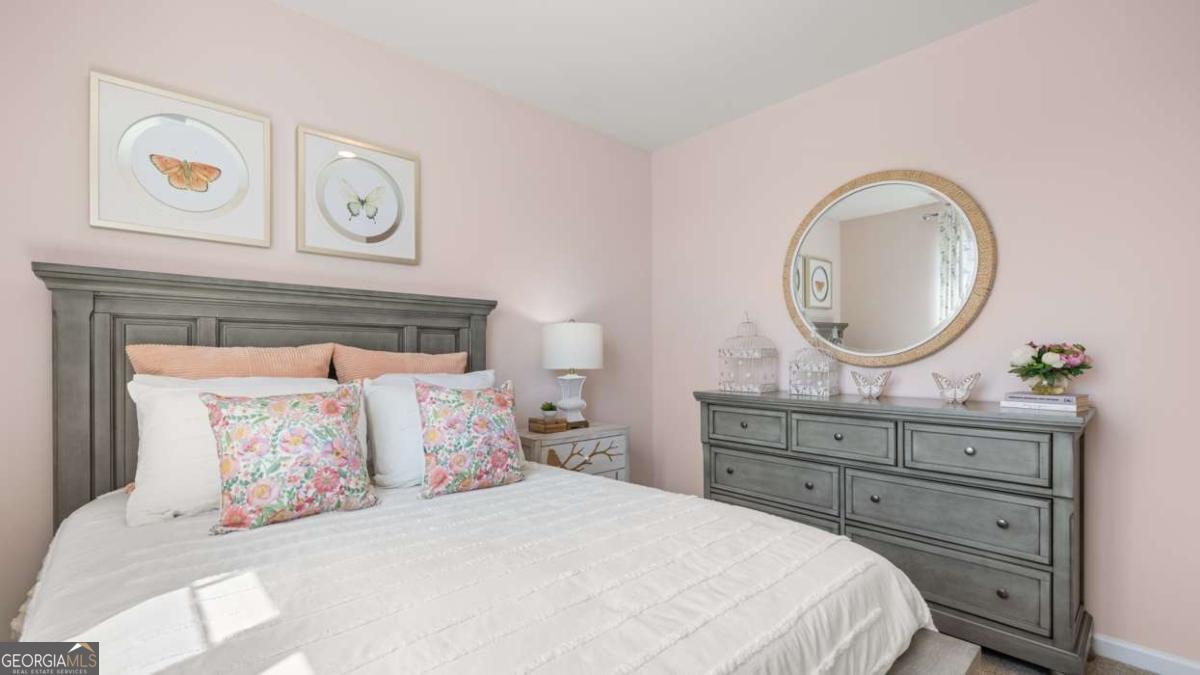 204 Cattle Drive Perry, GA 31069 - Photo 29 of 44 a bedroom with a bed and a dresser