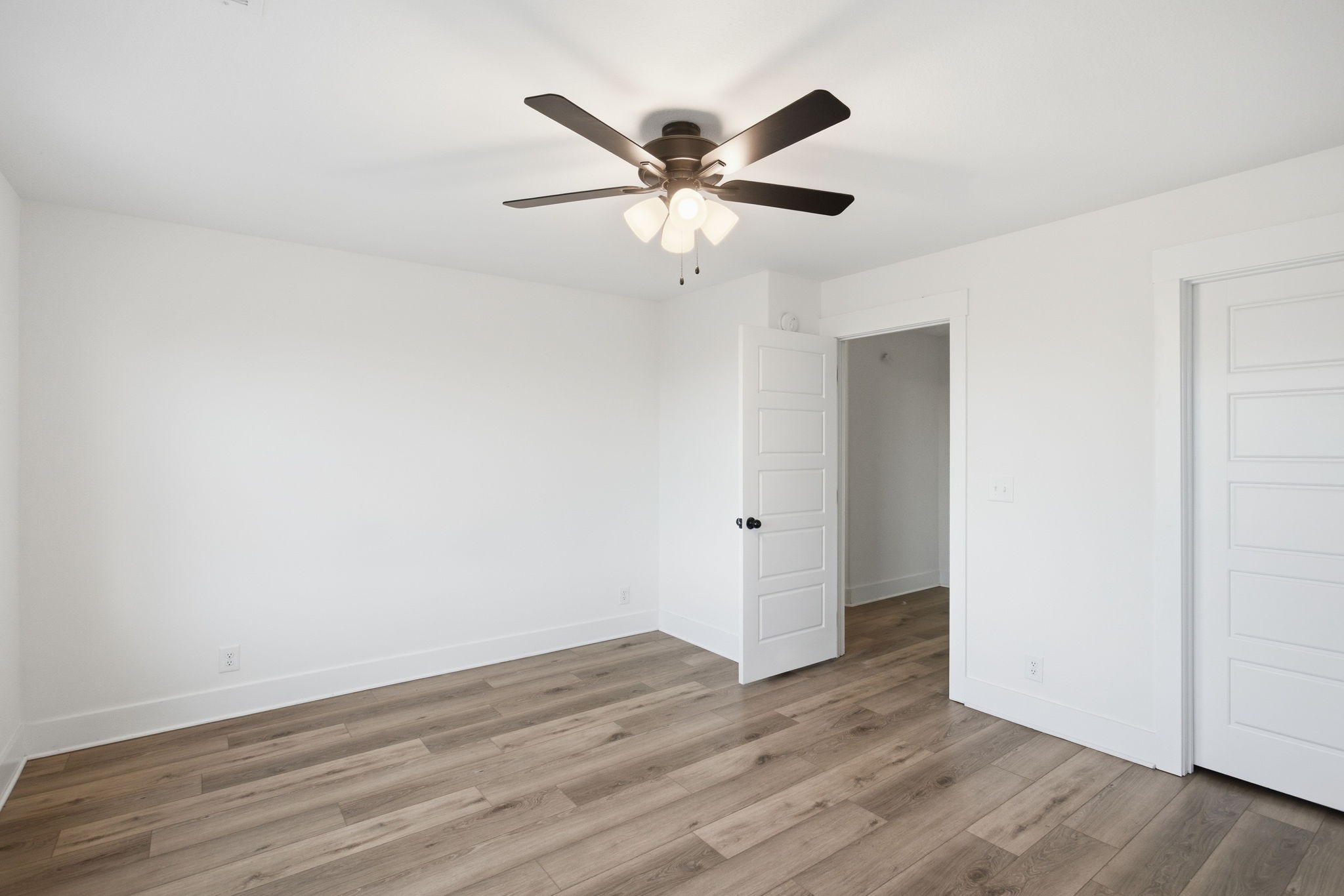 2511 Ashland City Road Clarksville, TN 37043 - Photo 19 of 31 a view of an empty room with wooden floor