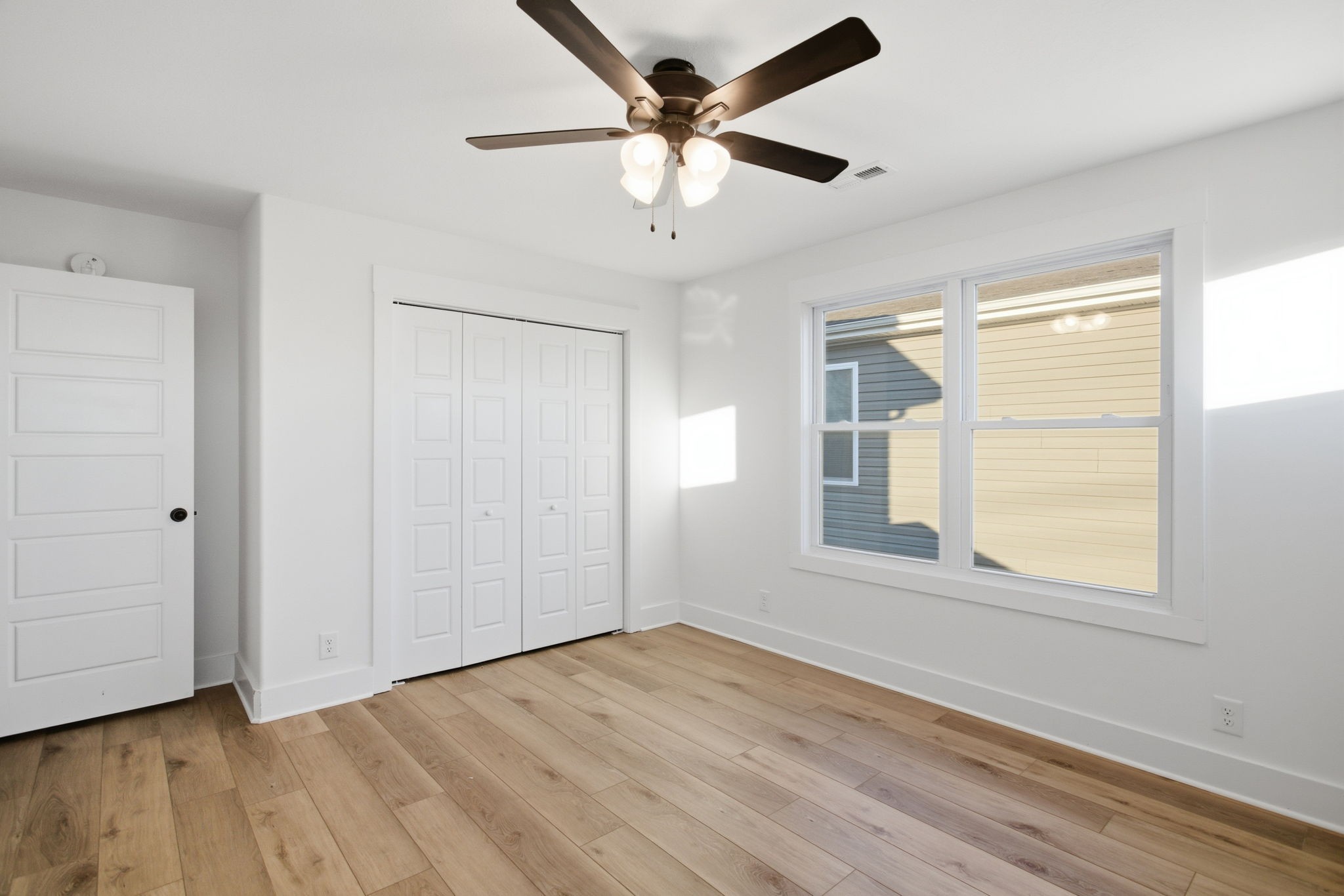 2511 Ashland City Road Clarksville, TN 37043 - Photo 23 of 31 wooden floor in an empty room with a window