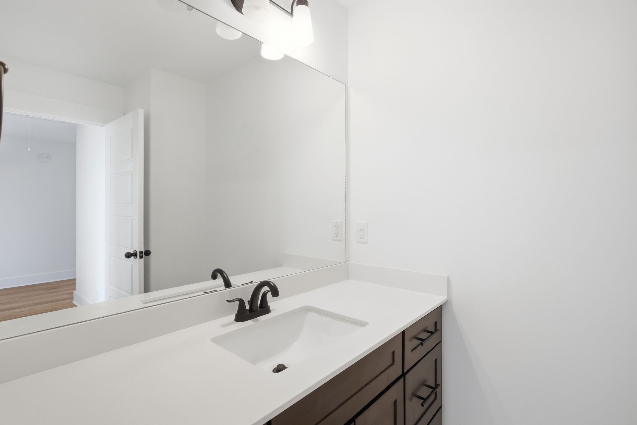 2511 Ashland City Road Clarksville, TN 37043 - Photo 26 of 31 a bathroom with a sink and a mirror