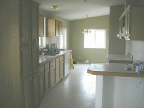 14300 Rutherford Road Yakima, WA 98903 - Photo 4 of 5 a bathroom with sink a mirror a vanity and window