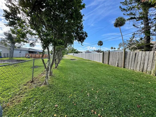 a view of a backyard with a garden