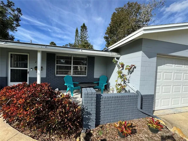 a view of house with outdoor space