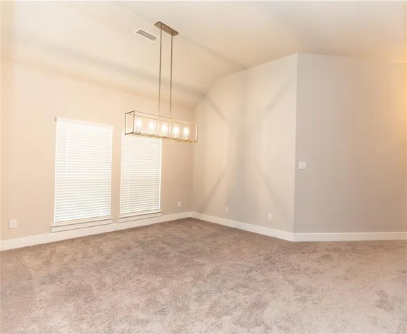 a view of an empty room with window