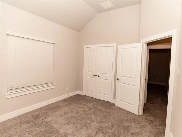 a view of a room with an empty space