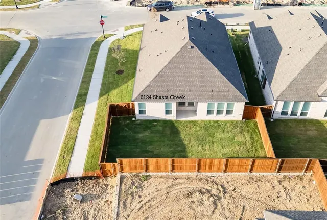 a view of a house with a swimming pool