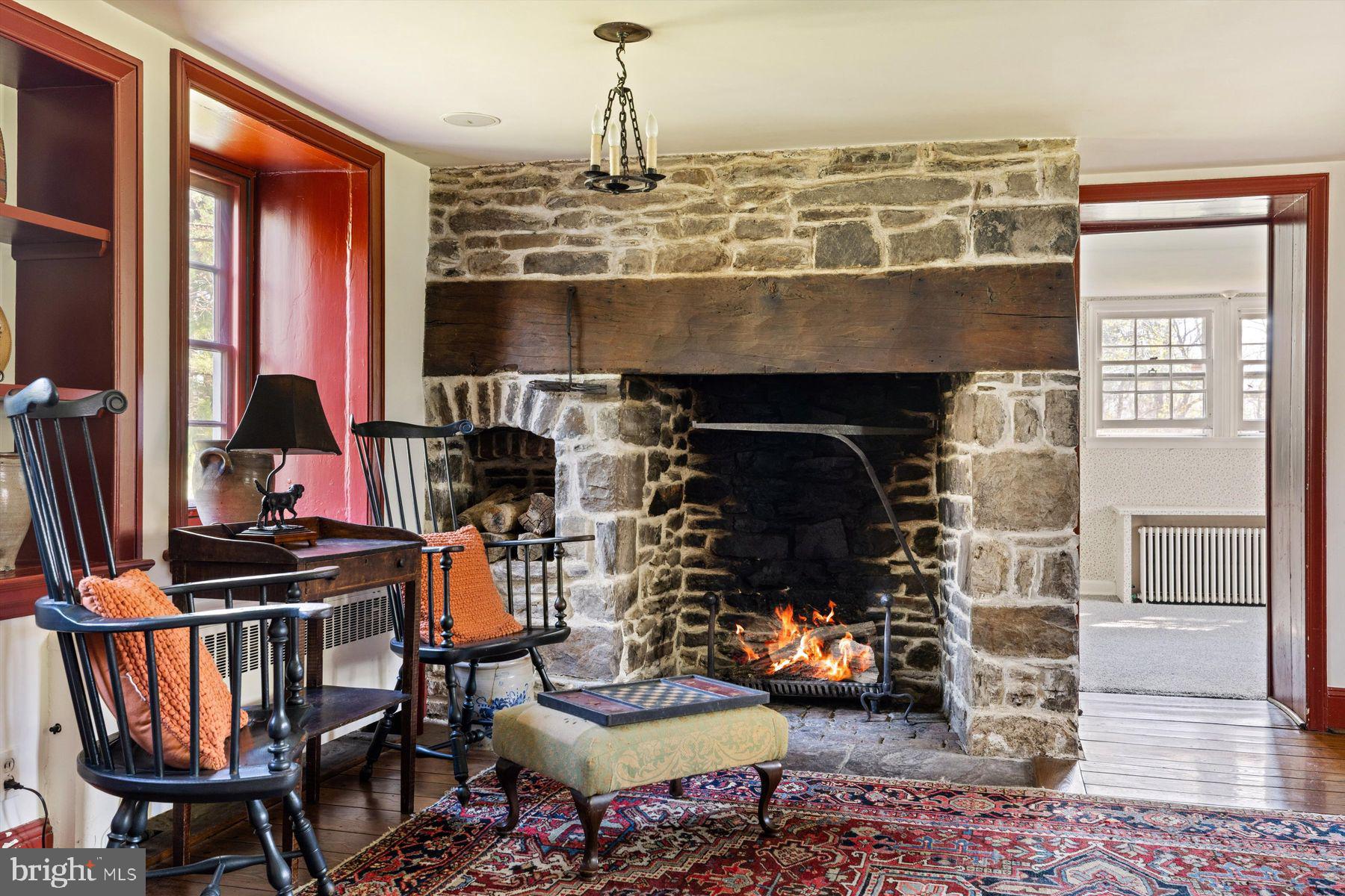 1566 Woodside Road Yardley, PA 19067 - Photo 12 of 50 a kitchen with a stove and a fireplace