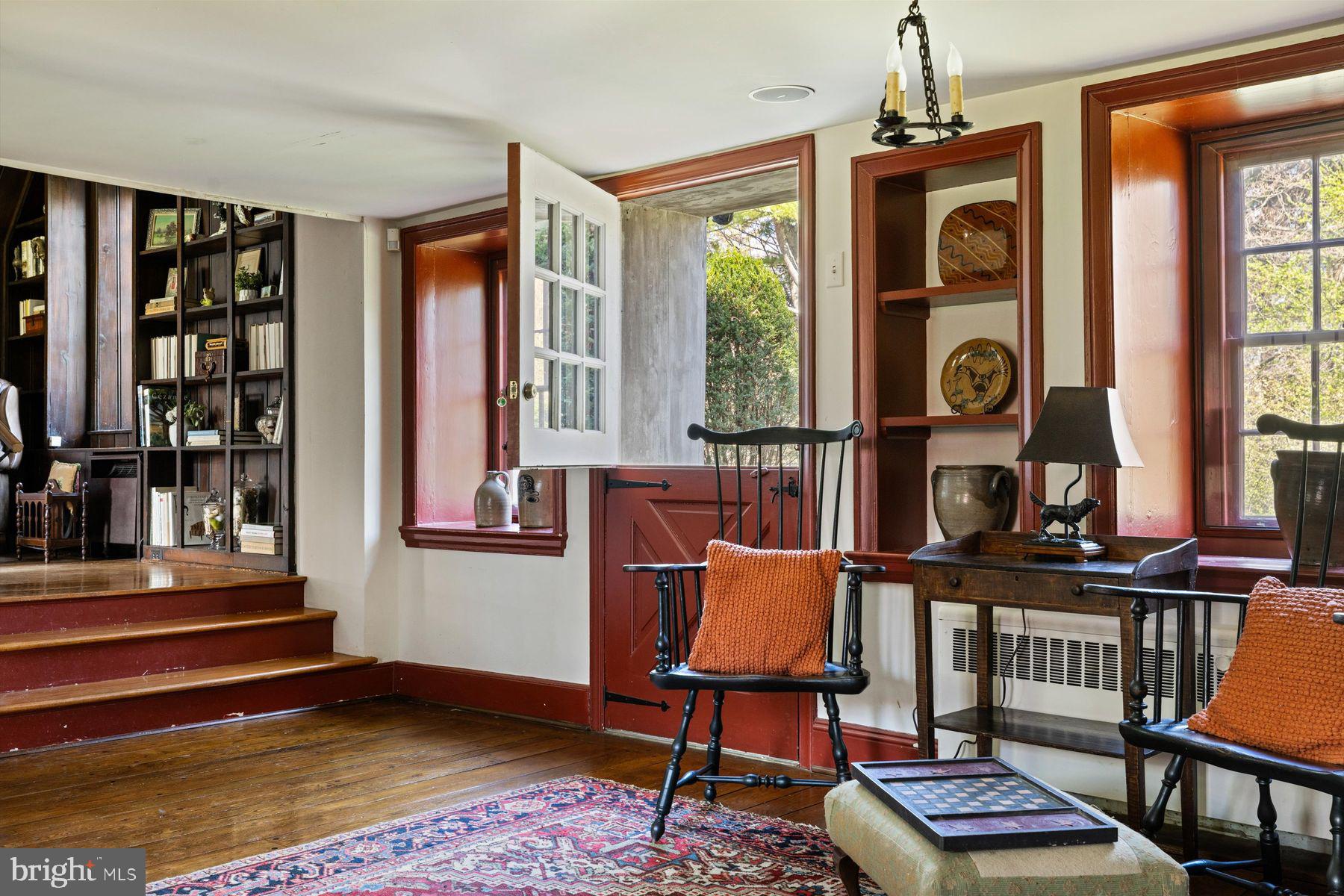 1566 Woodside Road Yardley, PA 19067 - Photo 14 of 50 a living room with furniture and a window