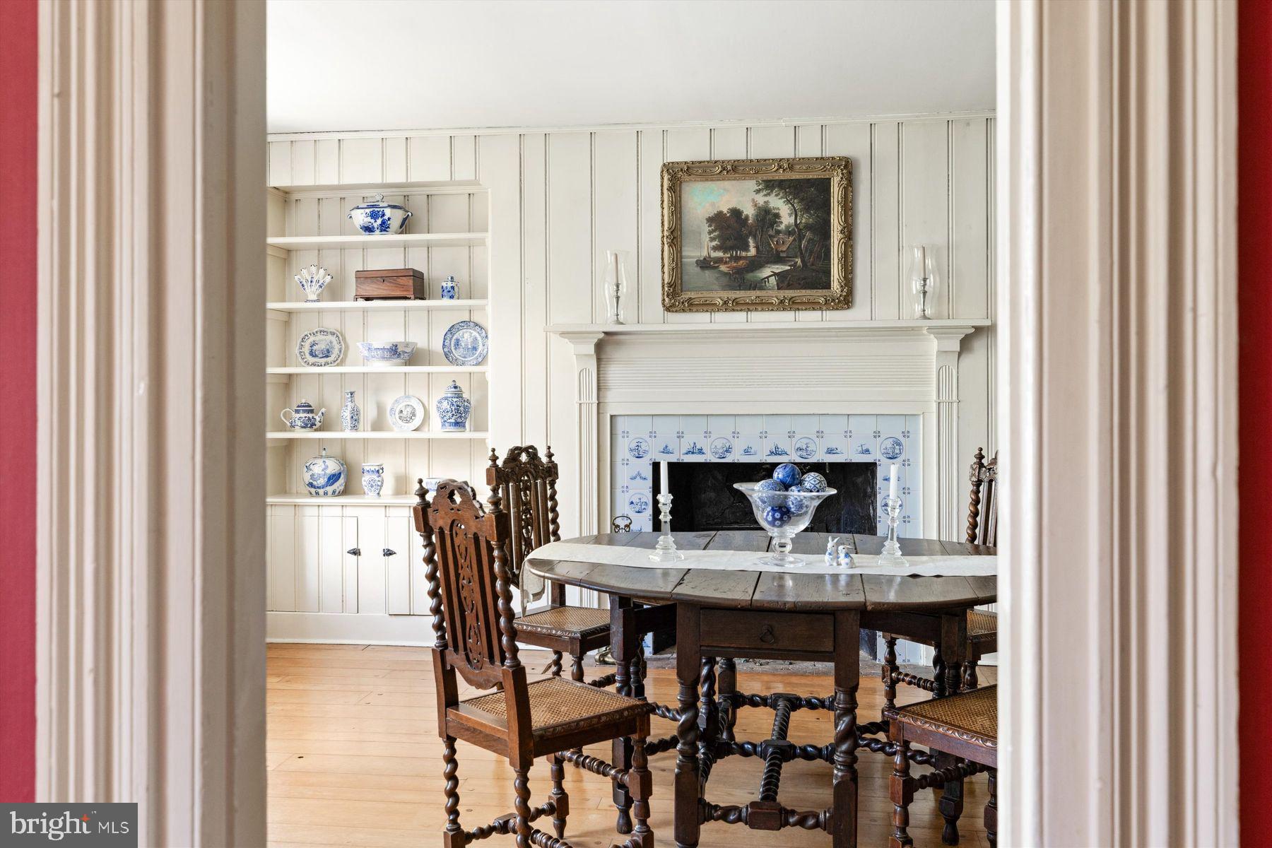 1566 Woodside Road Yardley, PA 19067 - Photo 15 of 50 a dining room with furniture and a fireplace