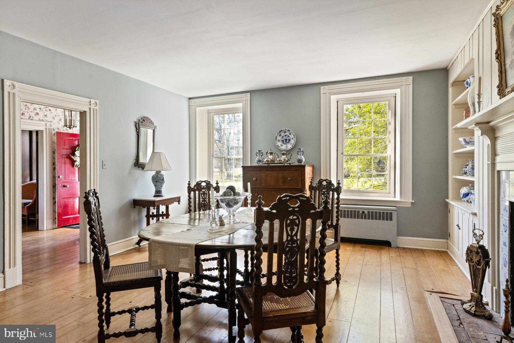 1566 Woodside Road Yardley, PA 19067 - Photo 18 of 50 a view of a dining room with furniture window and wooden floor