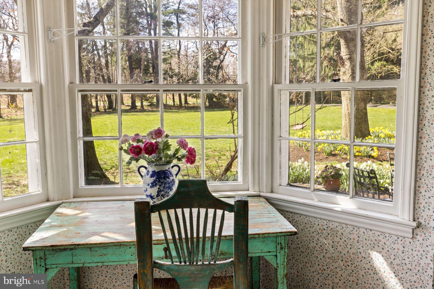 1566 Woodside Road Yardley, PA 19067 - Photo 24 of 50 a view of a porch with furniture and garden