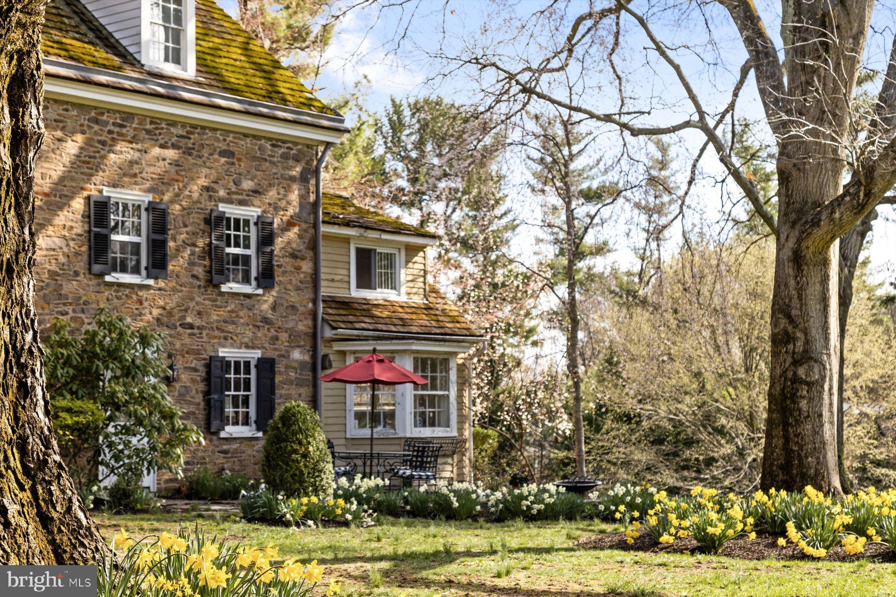 1566 Woodside Road Yardley, PA 19067 - Photo 25 of 50 a front view of a multi story residential apartment building with yard and parking space