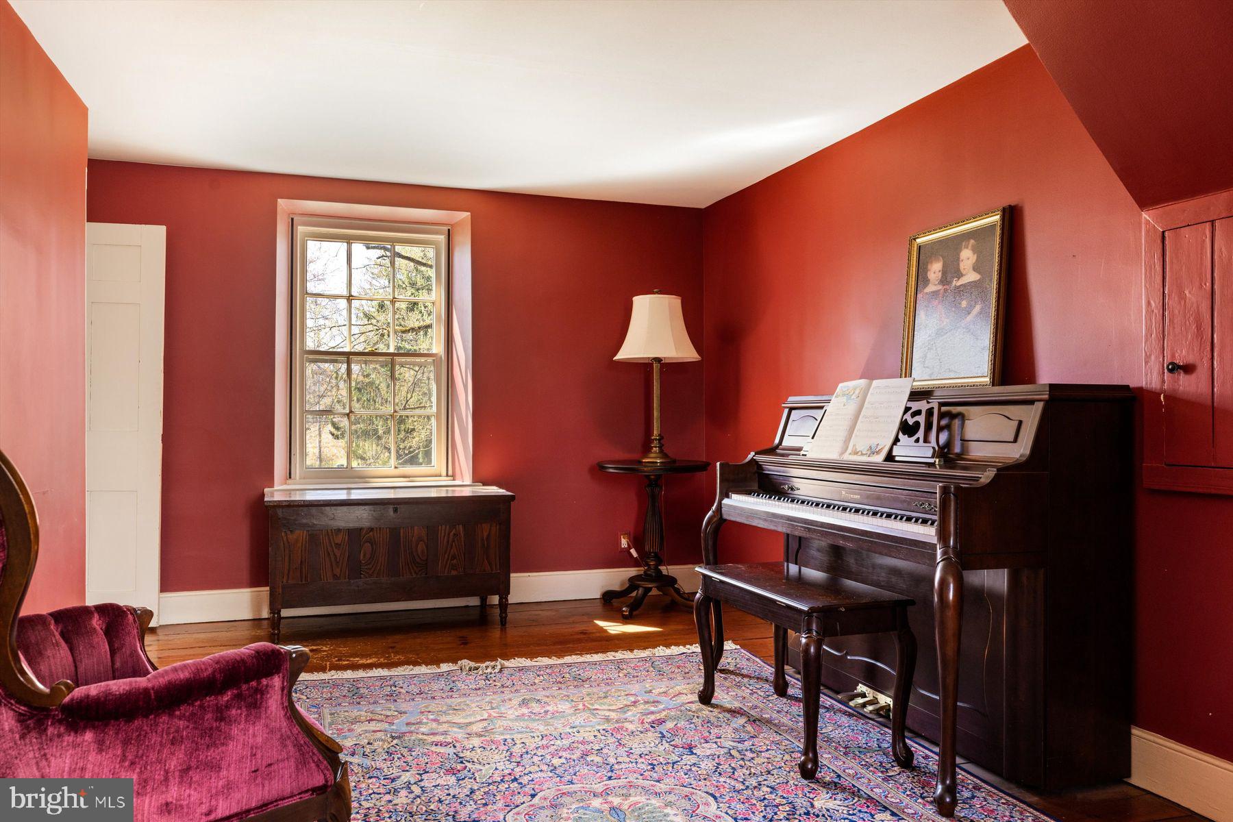 1566 Woodside Road Yardley, PA 19067 - Photo 31 of 50 a living room with furniture a rug and a window