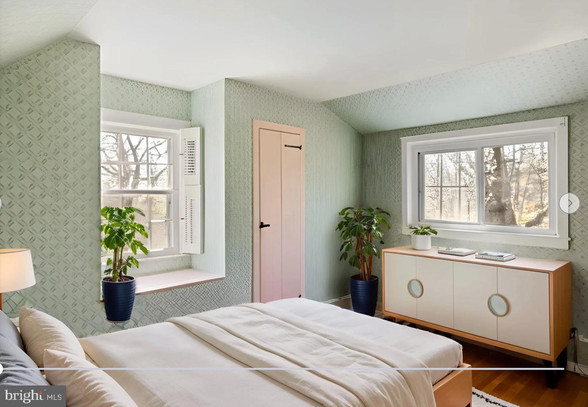 1566 Woodside Road Yardley, PA 19067 - Photo 34 of 50 a bedroom with a bed and a window