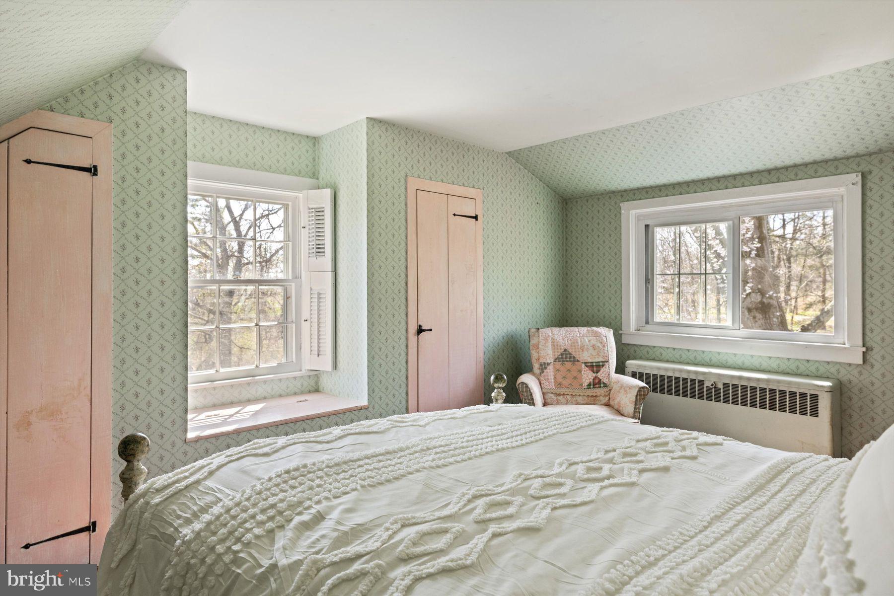 1566 Woodside Road Yardley, PA 19067 - Photo 35 of 50 a bedroom with a bed and a window