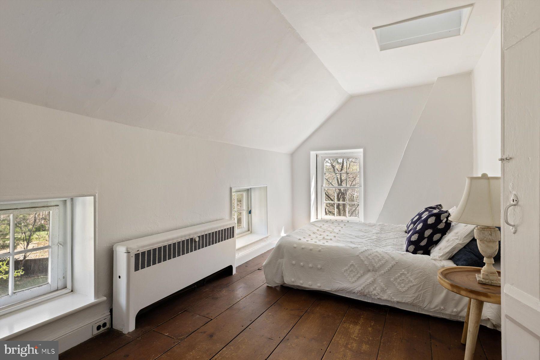 1566 Woodside Road Yardley, PA 19067 - Photo 39 of 50 a bedroom with a bed and a window