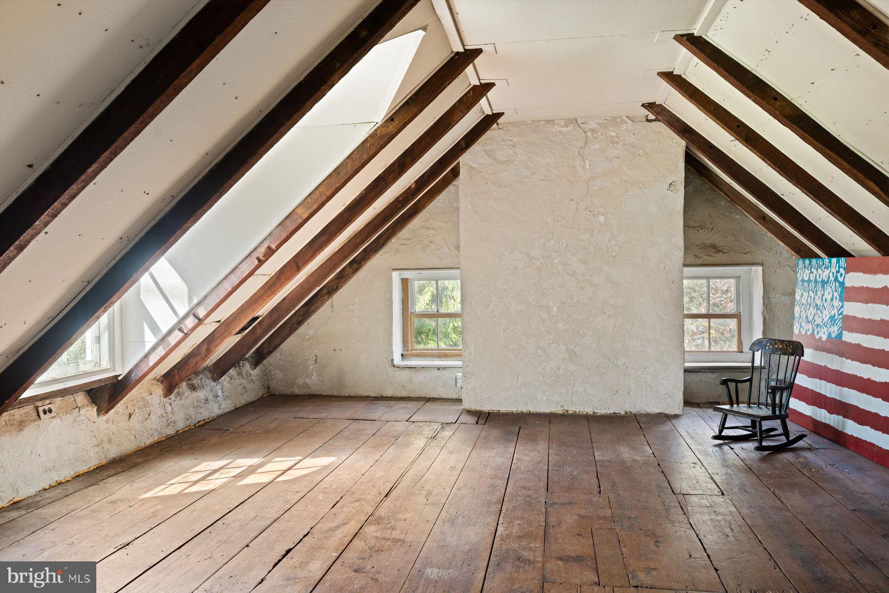 1566 Woodside Road Yardley, PA 19067 - Photo 43 of 50 a view of a room with wooden floor and windows