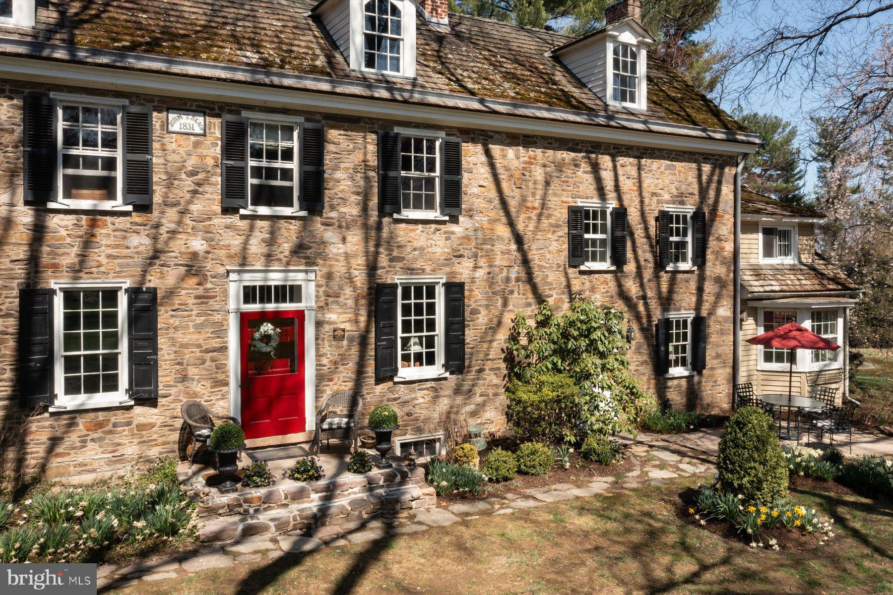 1566 Woodside Road Yardley, PA 19067 - Photo 44 of 50 a view of a house with potted plants