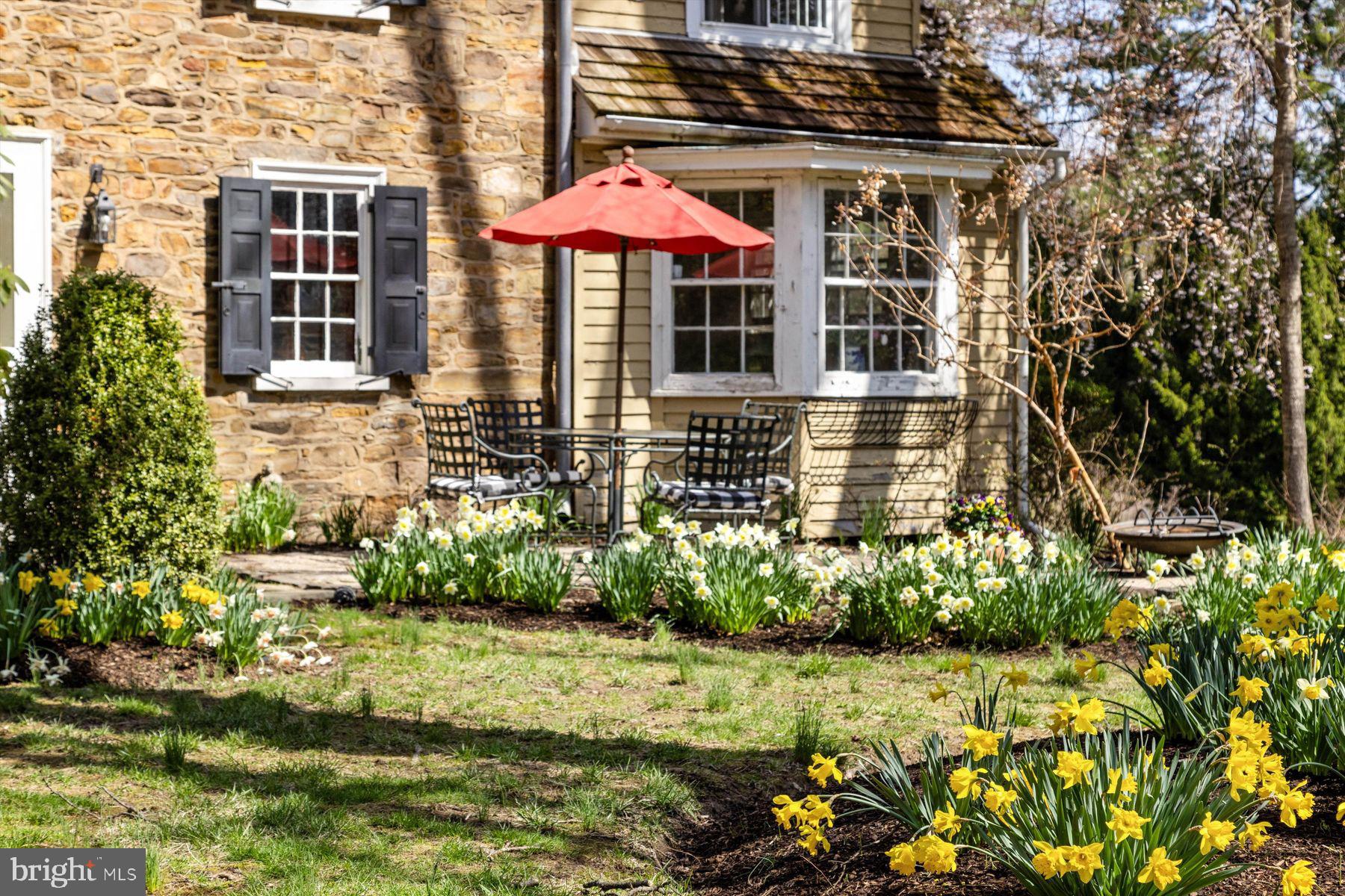1566 Woodside Road Yardley, PA 19067 - Photo 48 of 50 a front view of a house with a yard