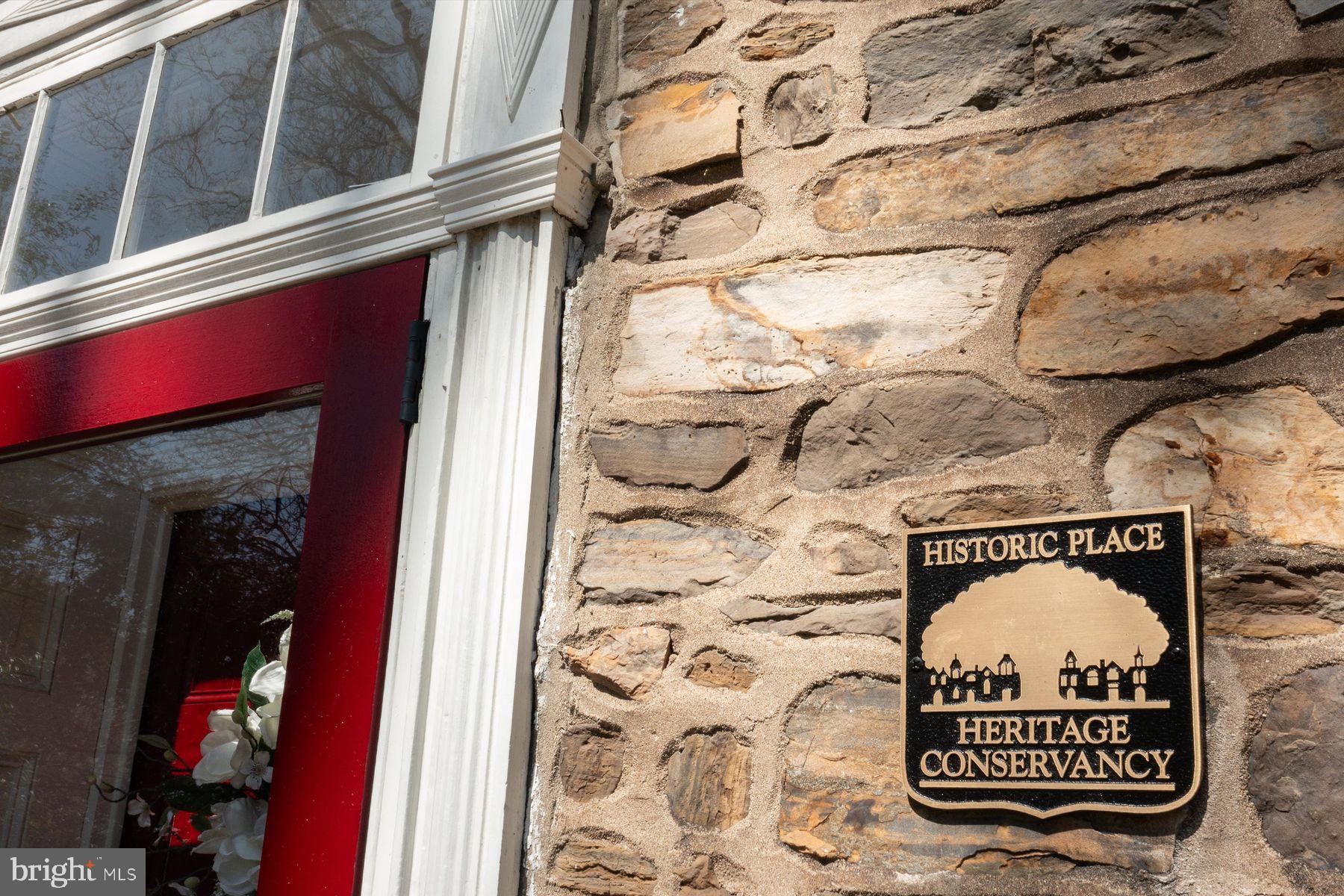 1566 Woodside Road Yardley, PA 19067 - Photo 50 of 50 a sign on the wall of a building