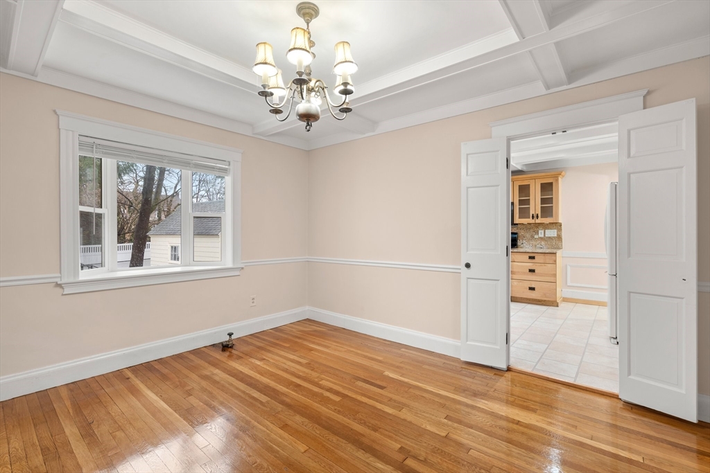 211 Cedar Street Dedham, MA 02026 - Photo 12 of 37 wooden floor in an empty room with a window