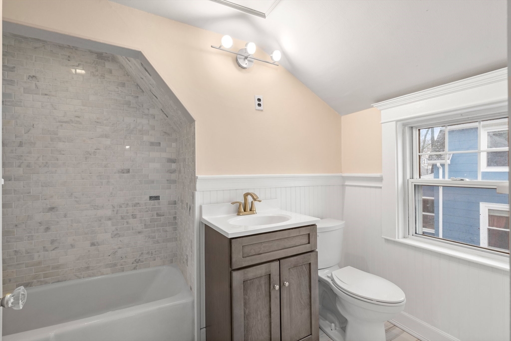 211 Cedar Street Dedham, MA 02026 - Photo 28 of 37 a bathroom with a sink toilet vanity and shower