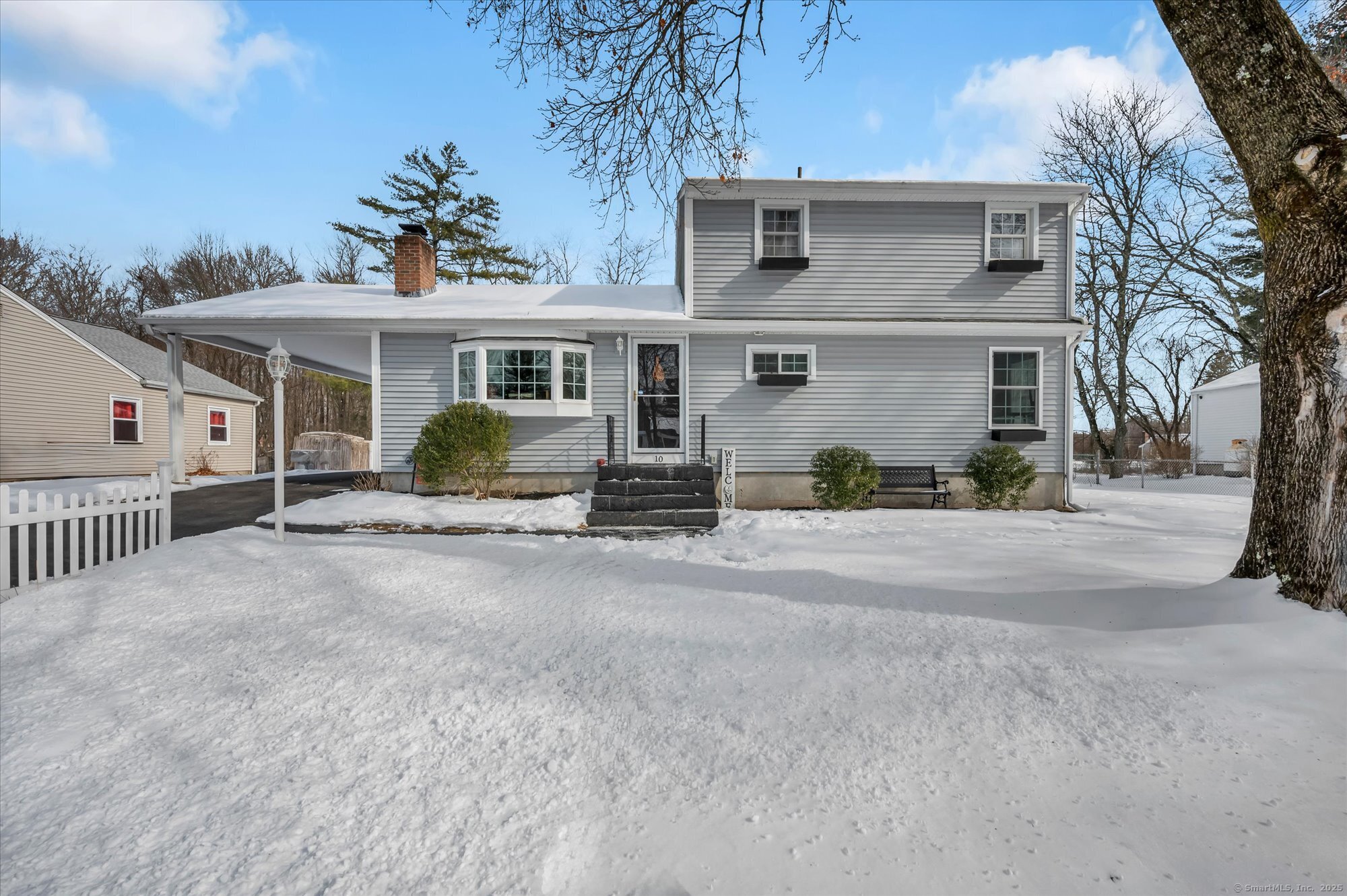 a front view of a house with a garage