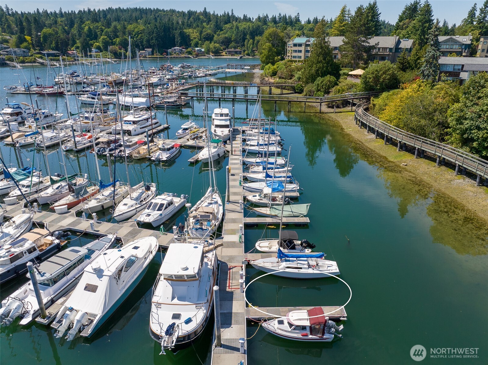 141 Parfitt Way Southwest, Unit M10 Bainbridge Island, WA 98110 - Photo 1 of 23 a city view with a lake view