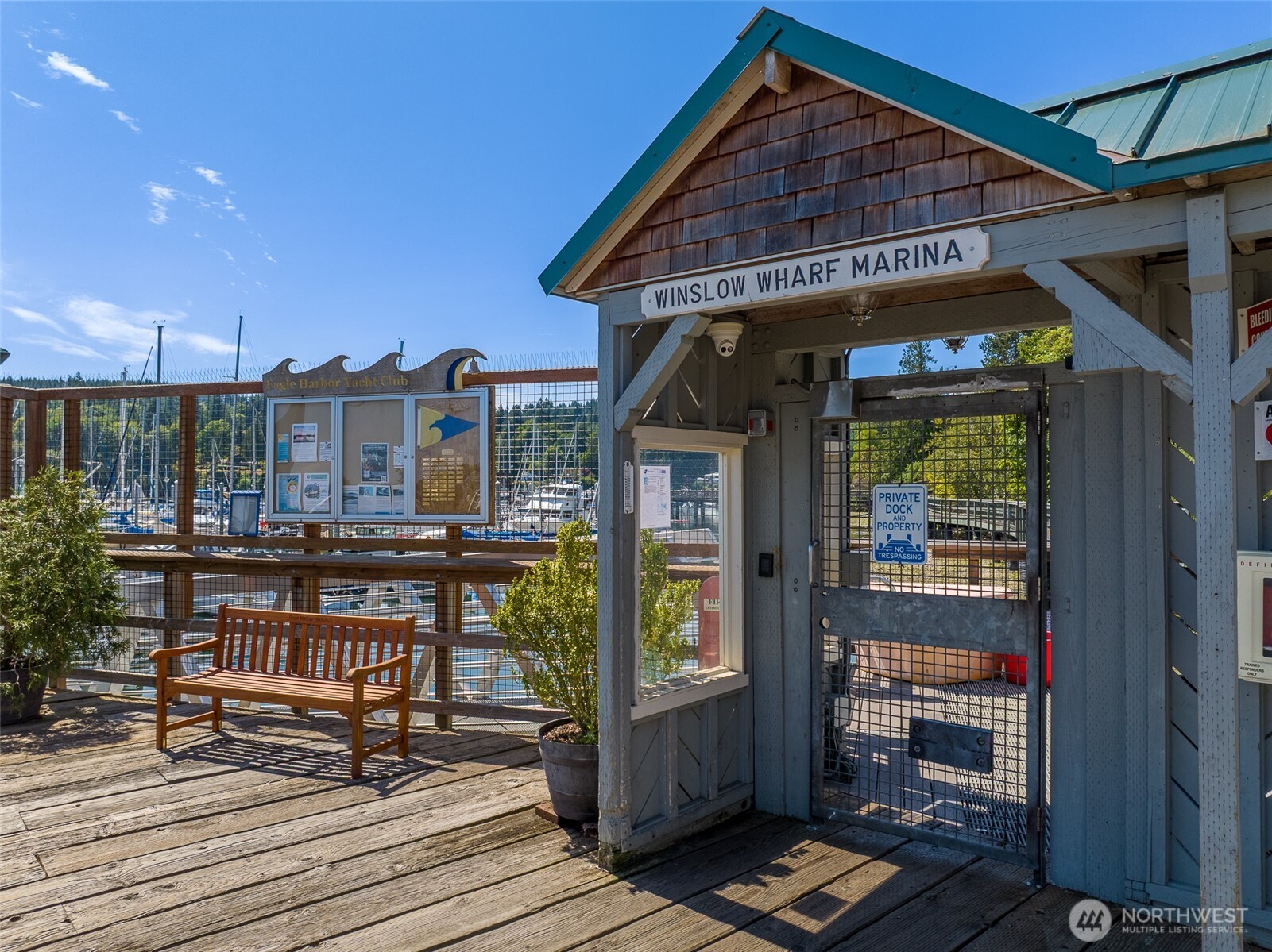 141 Parfitt Way Southwest, Unit M10 Bainbridge Island, WA 98110 - Photo 2 of 23 a view of a house with a porch