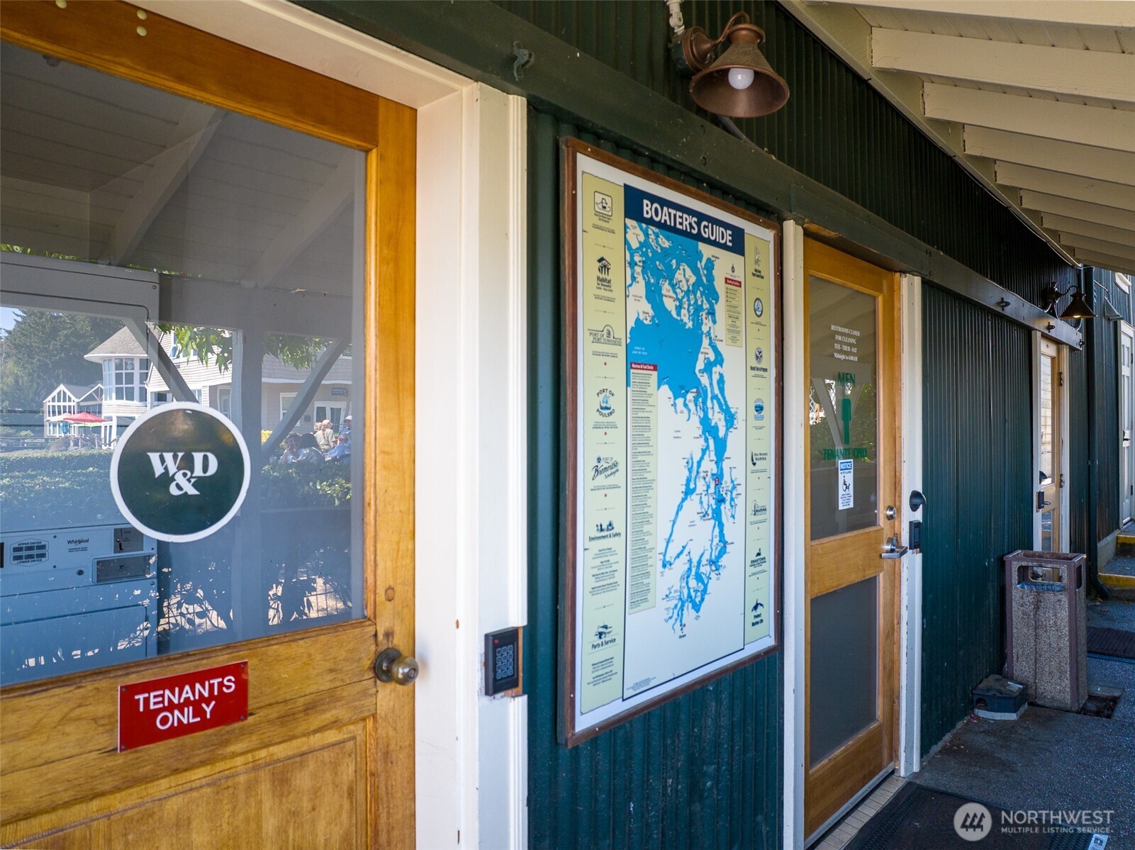 141 Parfitt Way Southwest, Unit M10 Bainbridge Island, WA 98110 - Photo 22 of 23 a view of a entryway door with wooden floor