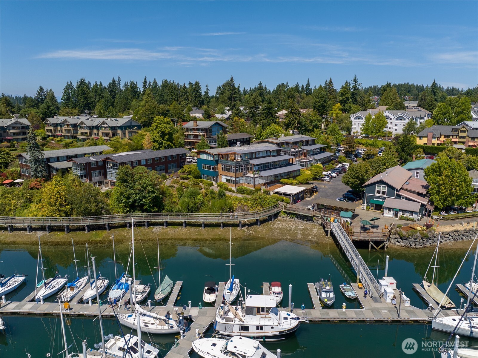 141 Parfitt Way Southwest, Unit M10 Bainbridge Island, WA 98110 - Photo 5 of 23 a view of a lake and a mountain view