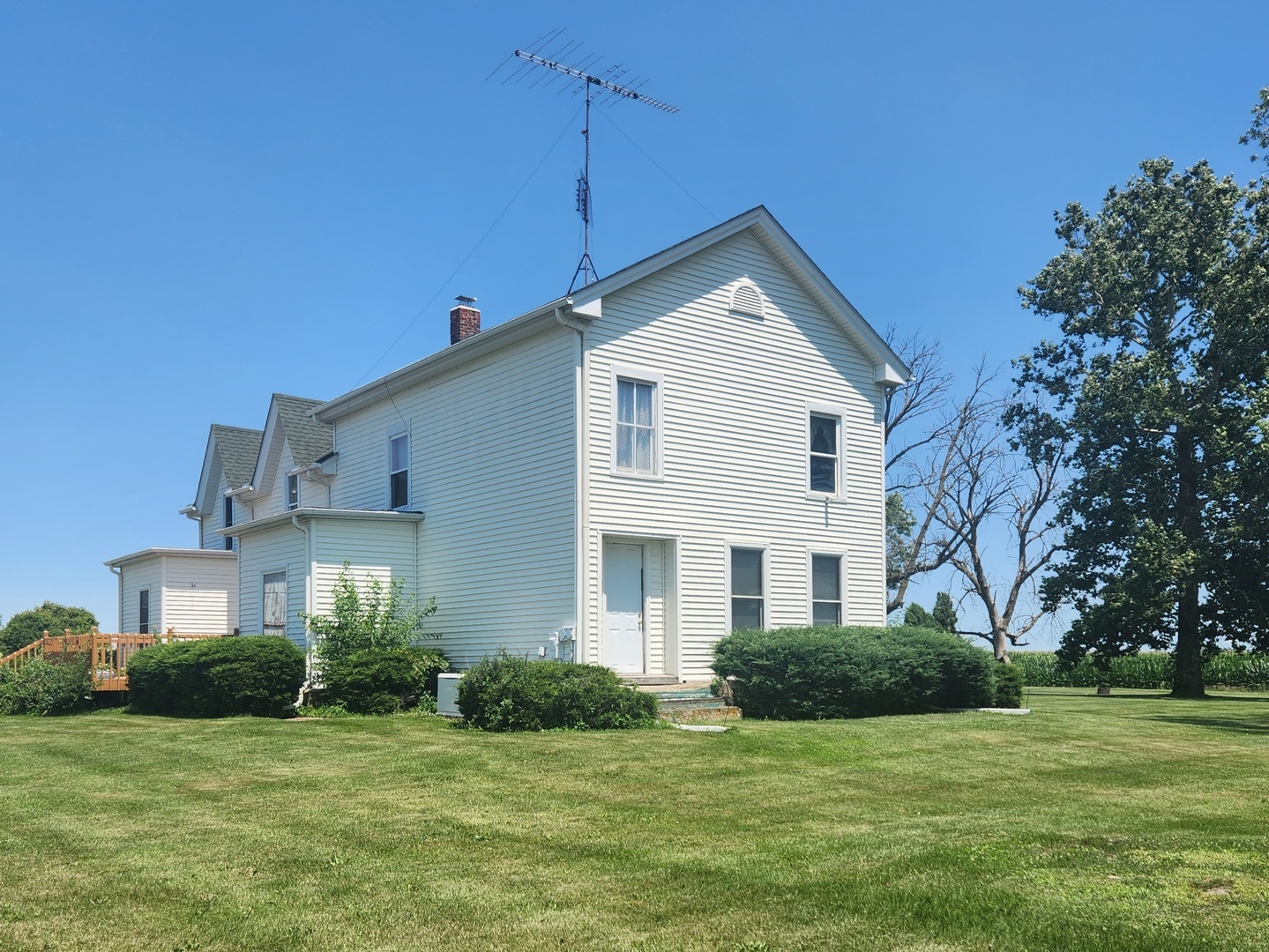 3877 Rich Road Malta, IL 60150 - Photo 1 of 43 a front view of a house with a yard