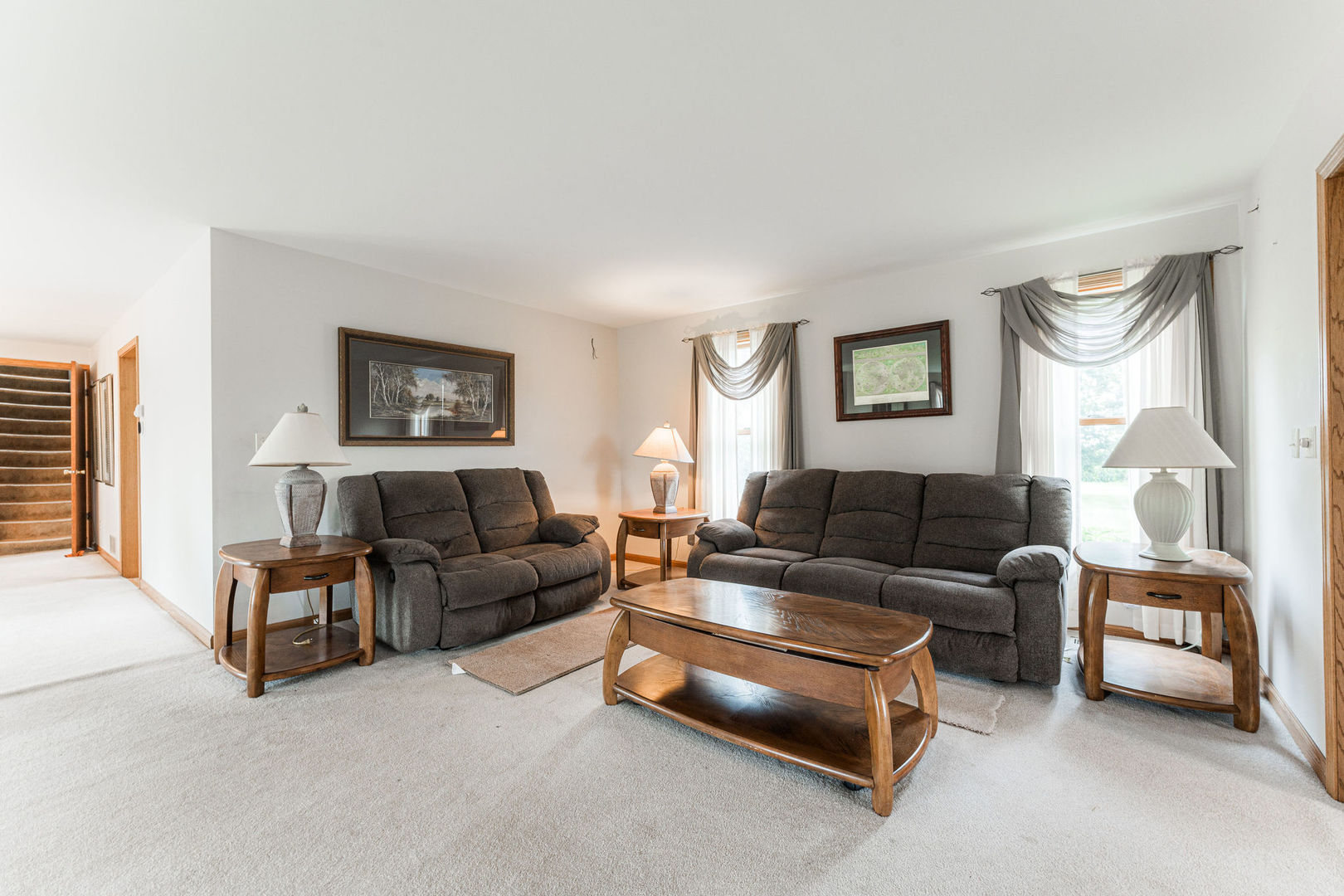 3877 Rich Road Malta, IL 60150 - Photo 18 of 43 a living room with furniture and a flat screen tv