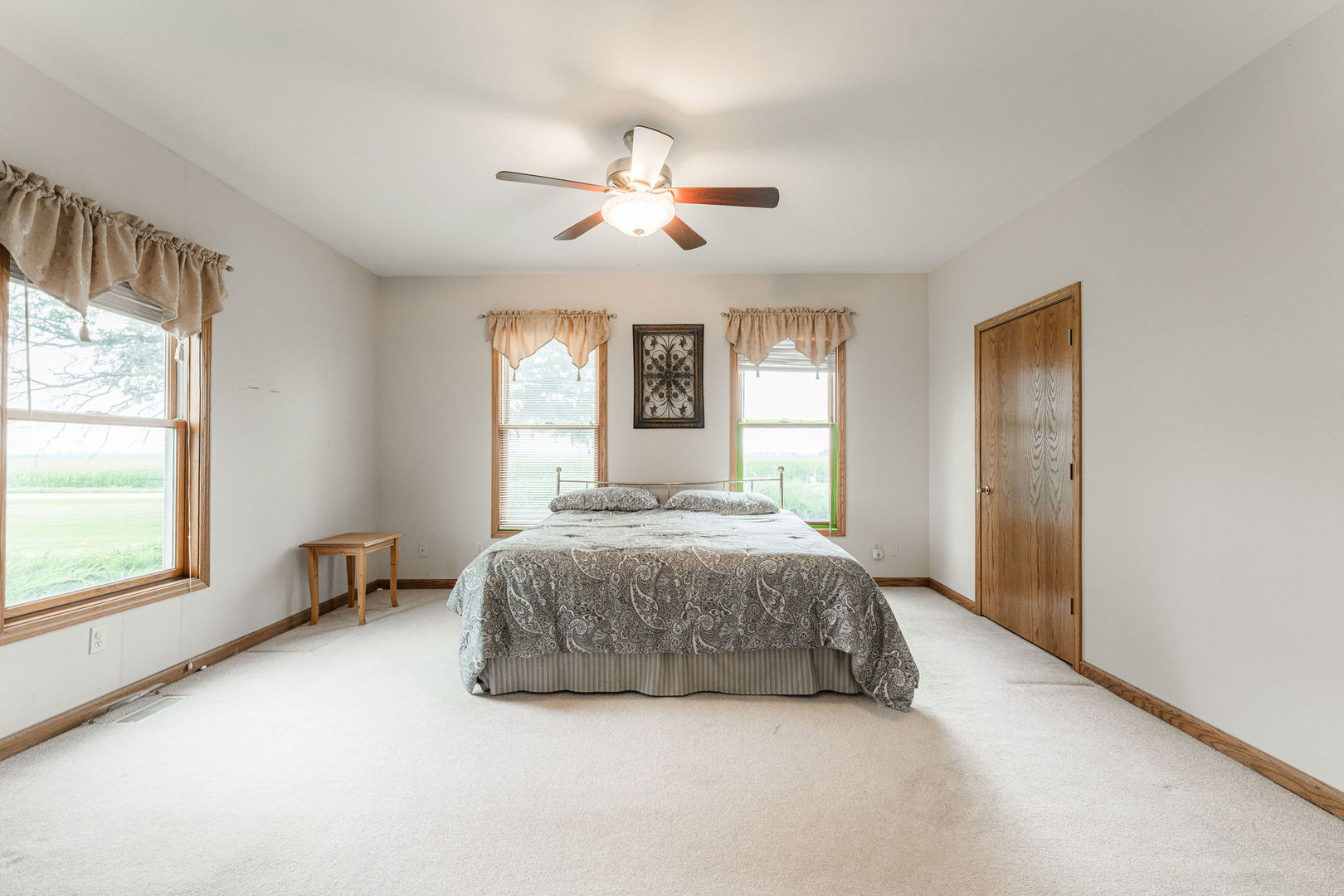 3877 Rich Road Malta, IL 60150 - Photo 20 of 43 a living room with a bed furniture and a window