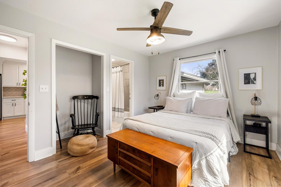 9555 Clyo Road Dayton, OH 45458 - Photo 22 of 31 This serene bedroom offers a bright retreat with warm wood floors and ample natural light.