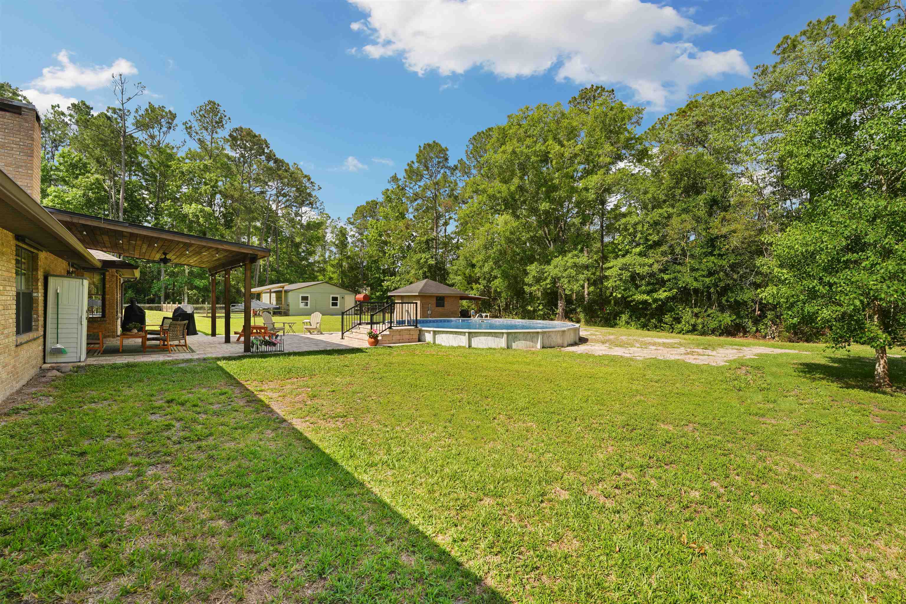 1805 Bennett Road St. Augustine, FL 32092 - Photo 41 of 65 a view of a swimming pool with a patio