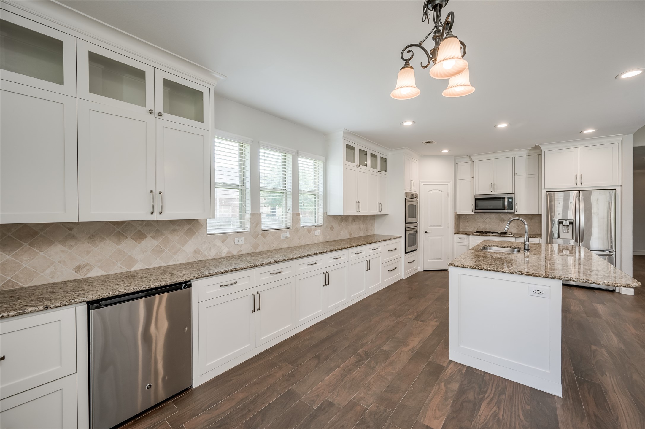 19006 Panther Peak Spring, TX 77388 - Photo 26 of 48 Kitchen view from Breakfast and Half bath area.