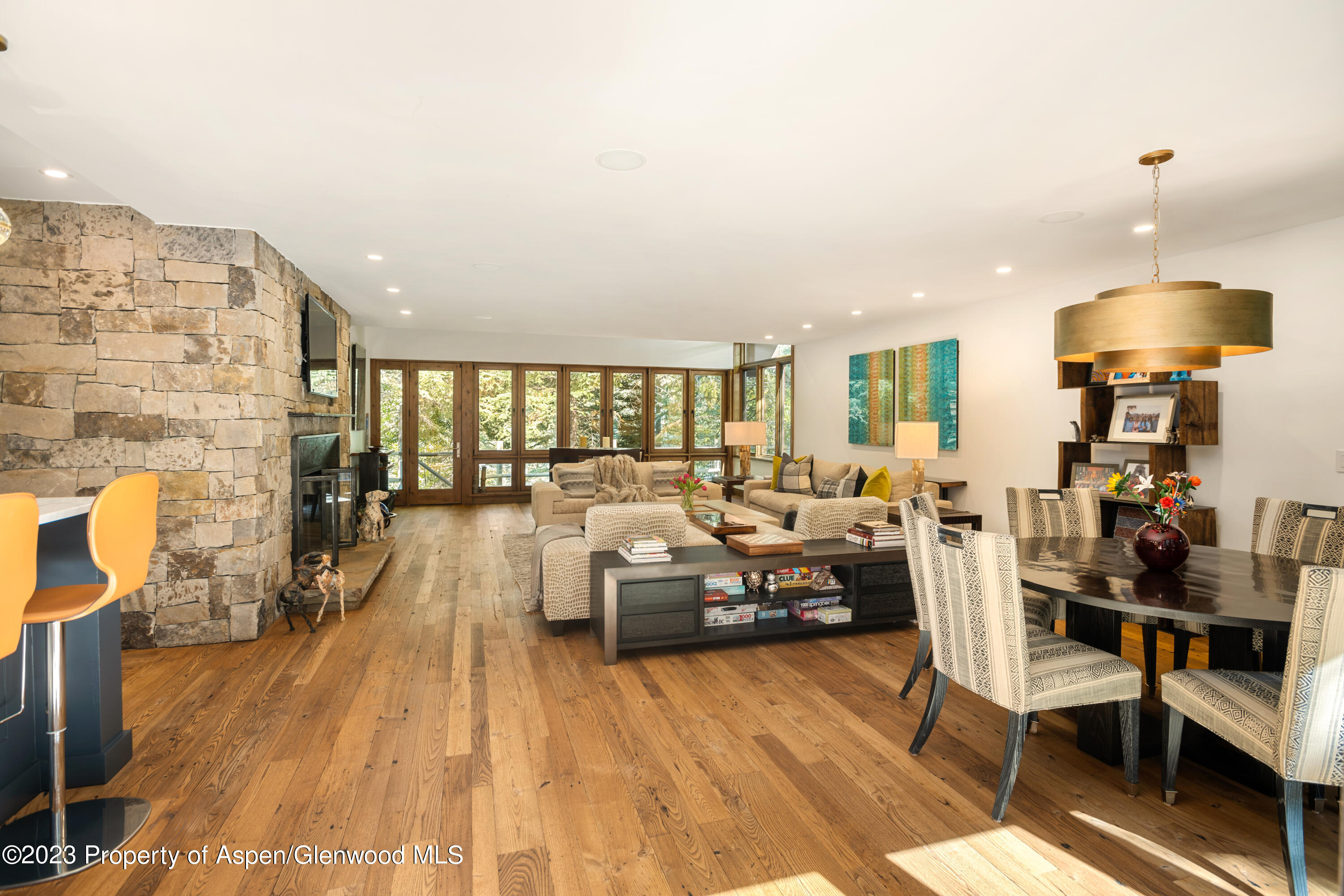 970 Powder Lane Aspen, CO 81611 - Photo 12 of 68 a living room with furniture and a fireplace