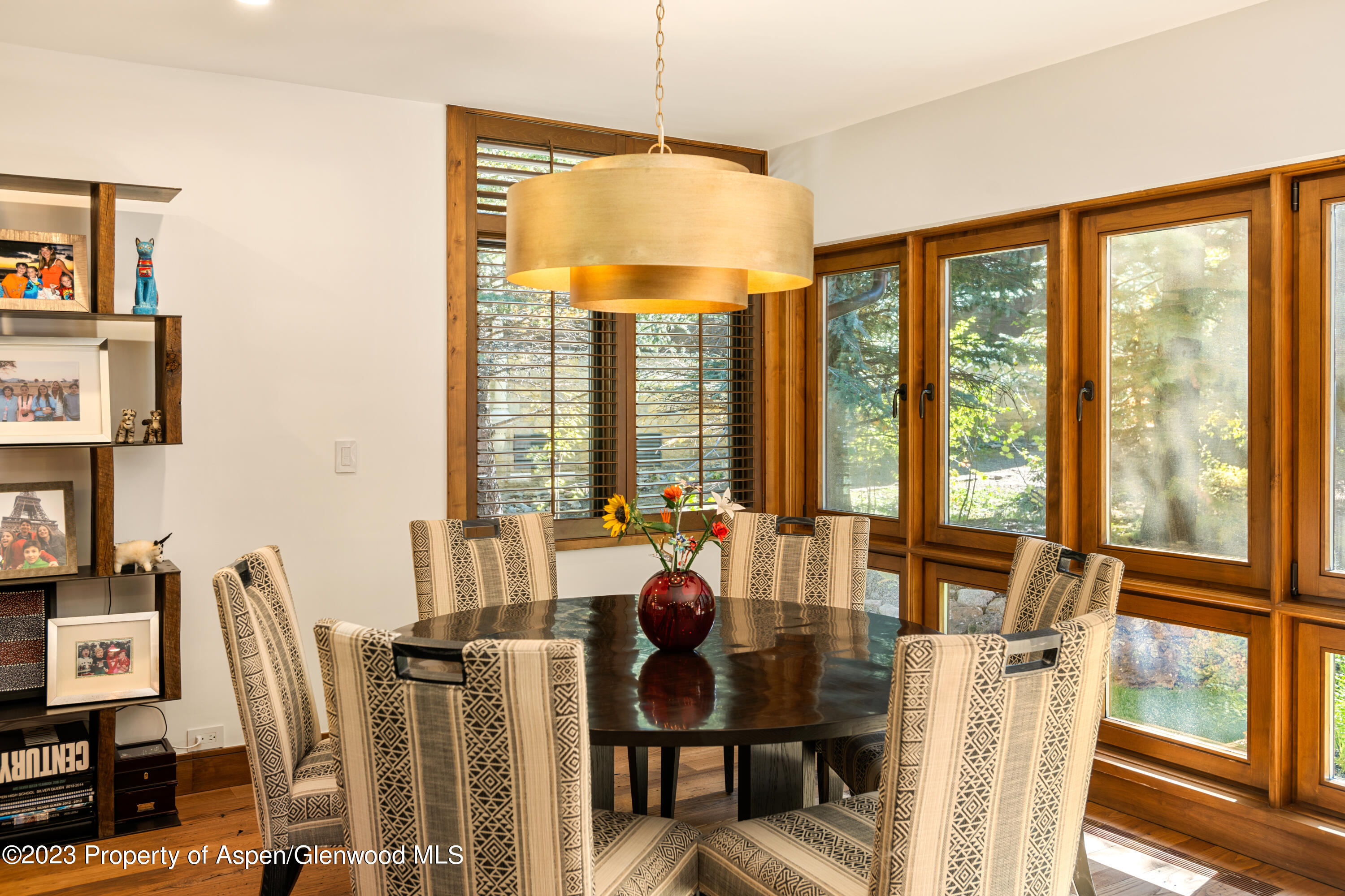 970 Powder Lane Aspen, CO 81611 - Photo 13 of 68 a view of a dining room with furniture window and outside view