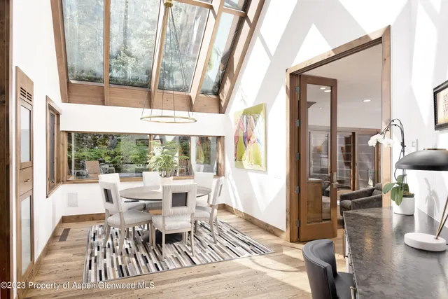 a view of a backyard with sitting area