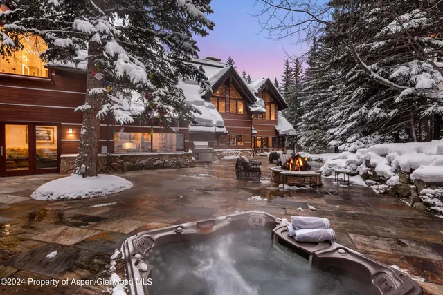 a living room with furniture fireplace and a flat screen tv