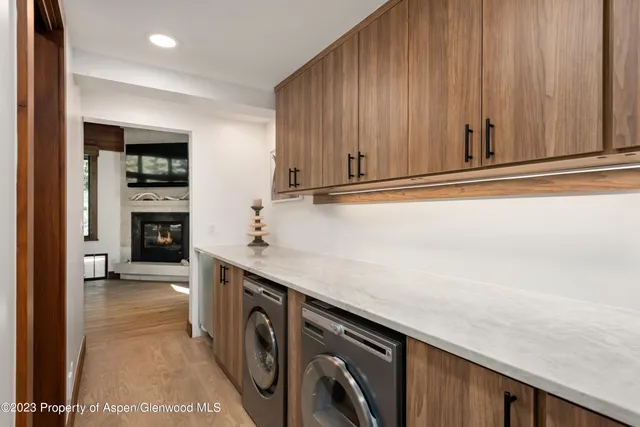 a bathroom with a shower and a sink