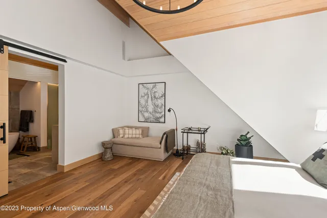 a view of a chairs and table in the patio