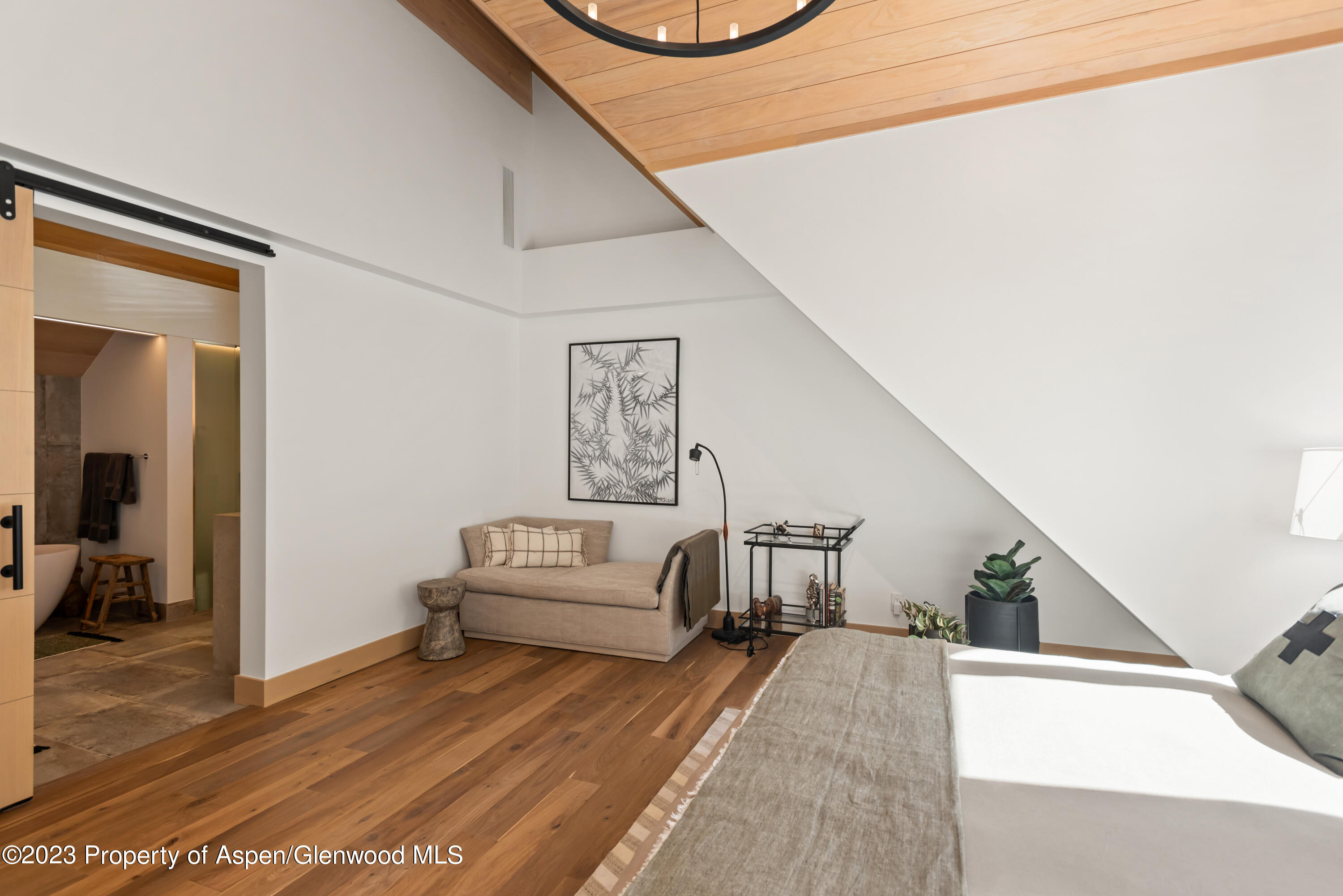 970 Powder Lane Aspen, CO 81611 - Photo 40 of 68 a living room with furniture and a wooden floor