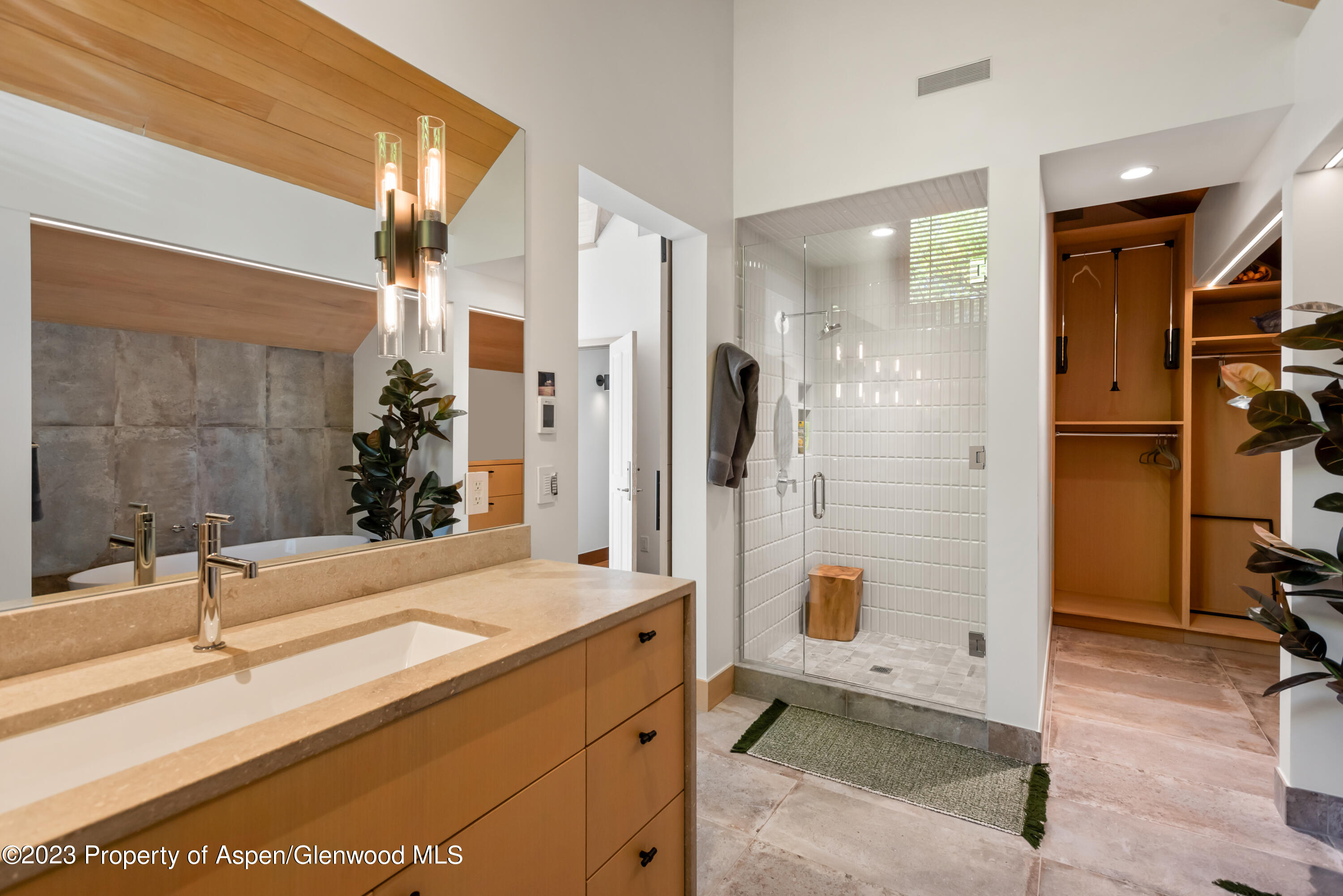 970 Powder Lane Aspen, CO 81611 - Photo 42 of 68 a bathroom with a shower and a sink