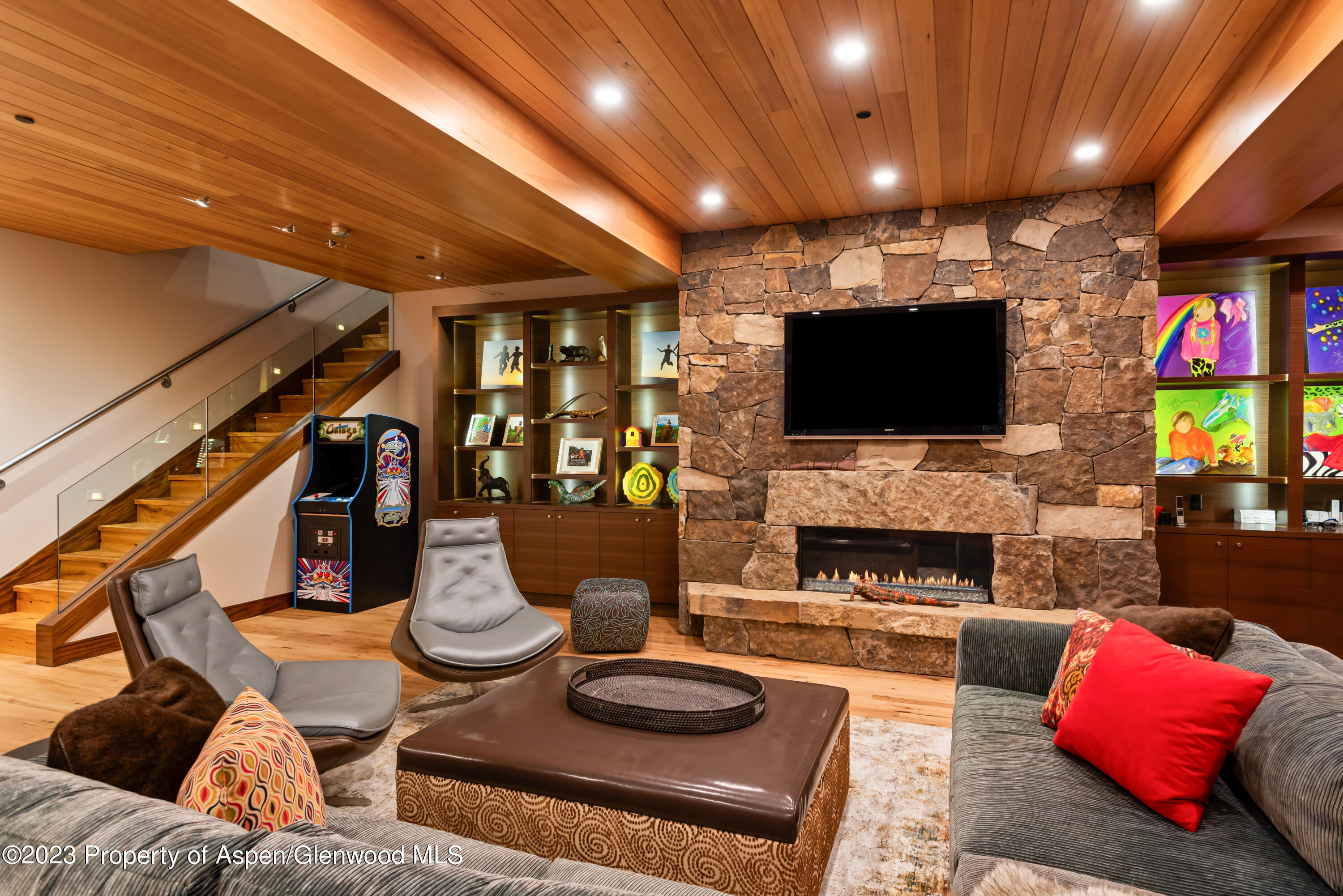 970 Powder Lane Aspen, CO 81611 - Photo 47 of 68 a living room with fireplace furniture and a flat screen tv